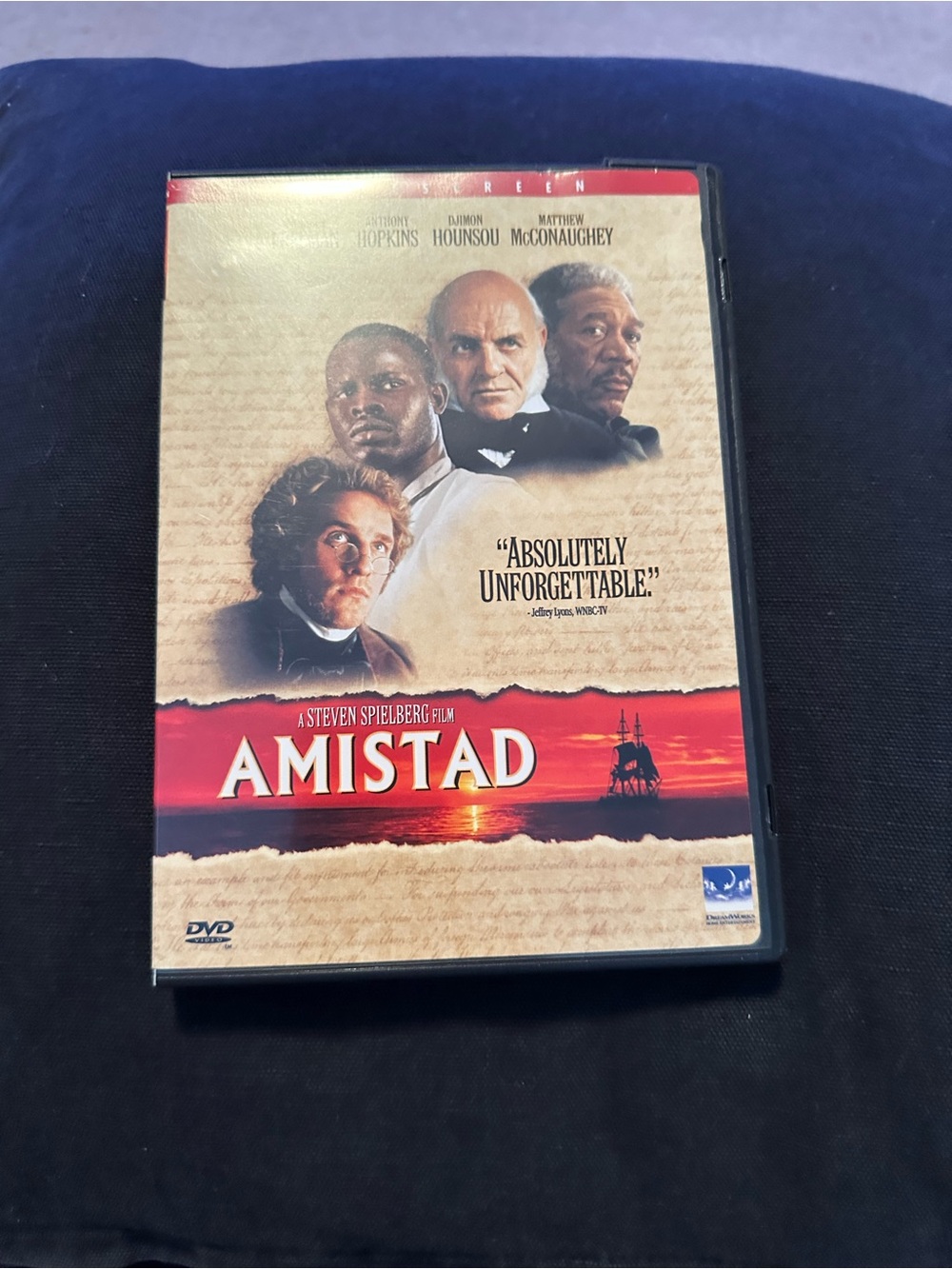 Amistad DVD - Red, Cream and Black Cover